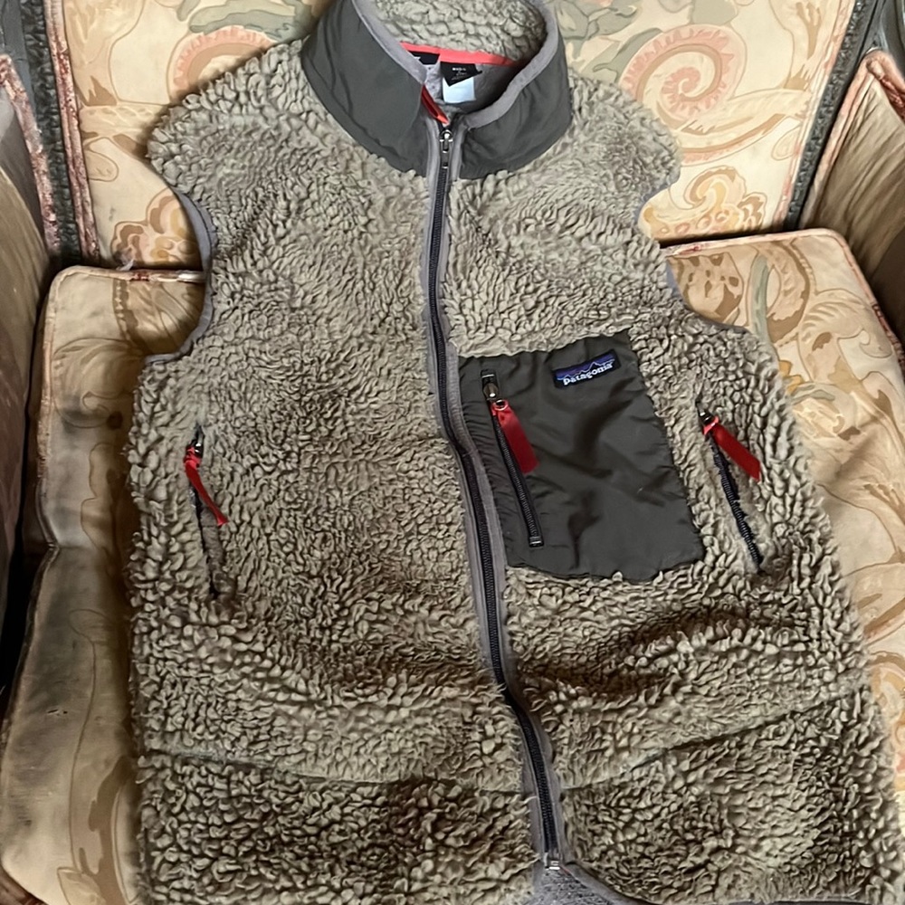 This is an X Large boys that fits a Small Woman . Great Shape light brown .